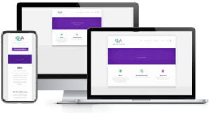 A purple and white website displaying on a laptop, tablet, and phone.